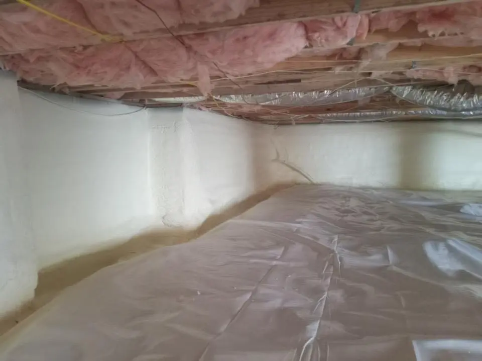 Crawl space encapsulation with closed-cell spray foam for Commercial Roof Restoration in Northfield